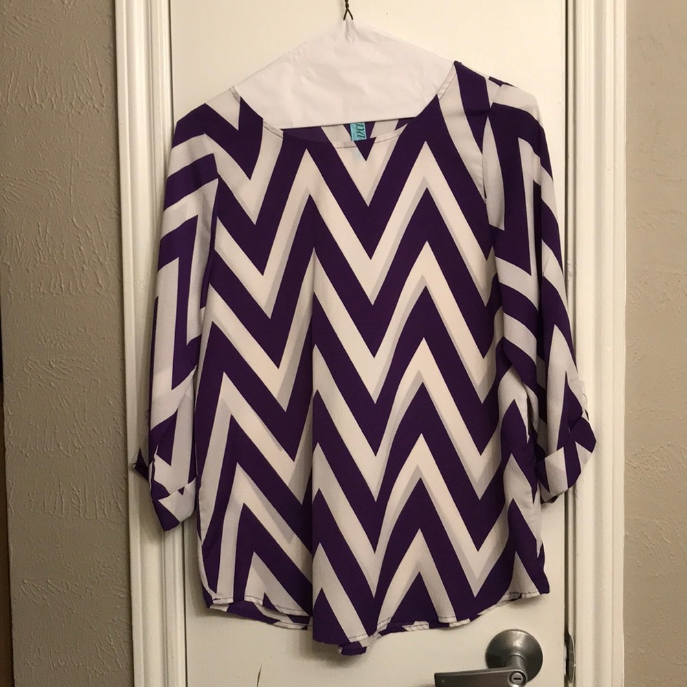Francesca’s chevron print cuffed blouse